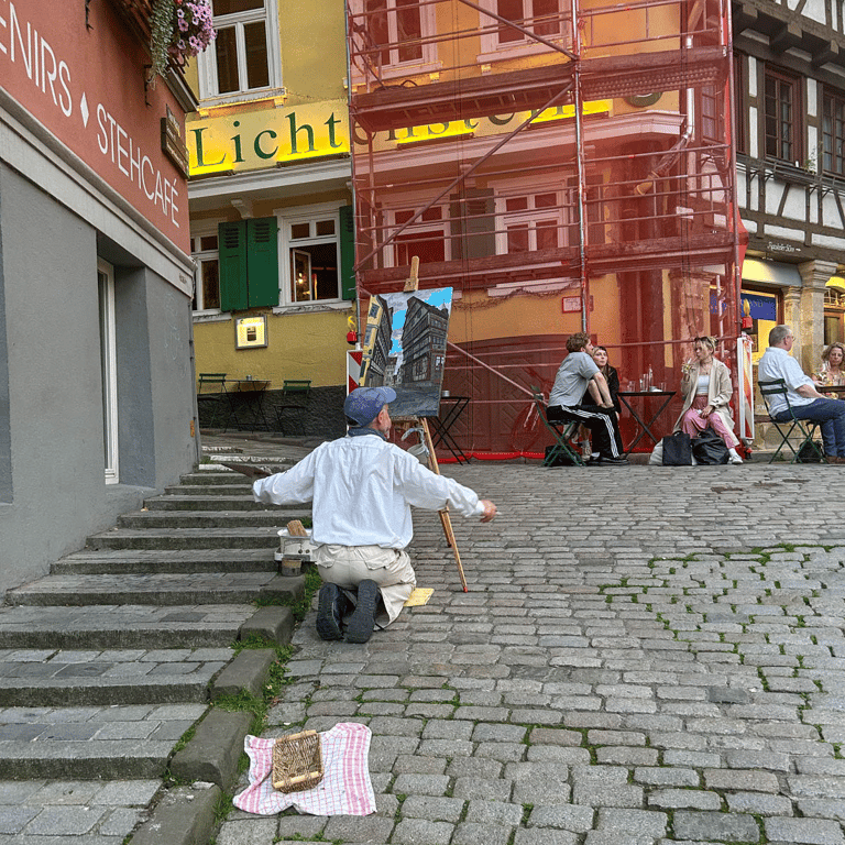 Painter painting the street and buildings