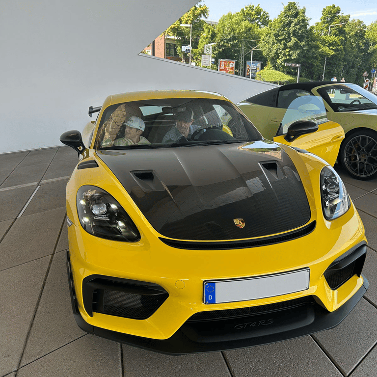 Tyler and dad in the Porsche