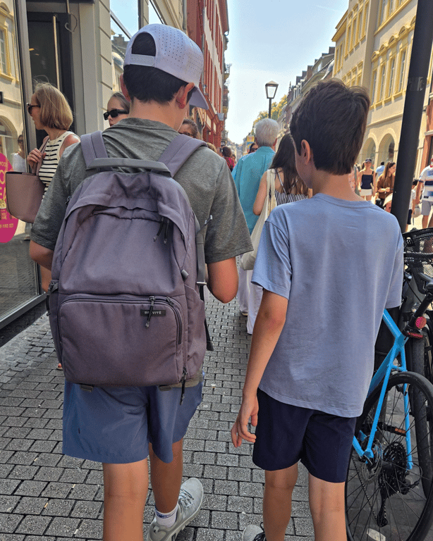 Tyler and Max walking and talking together