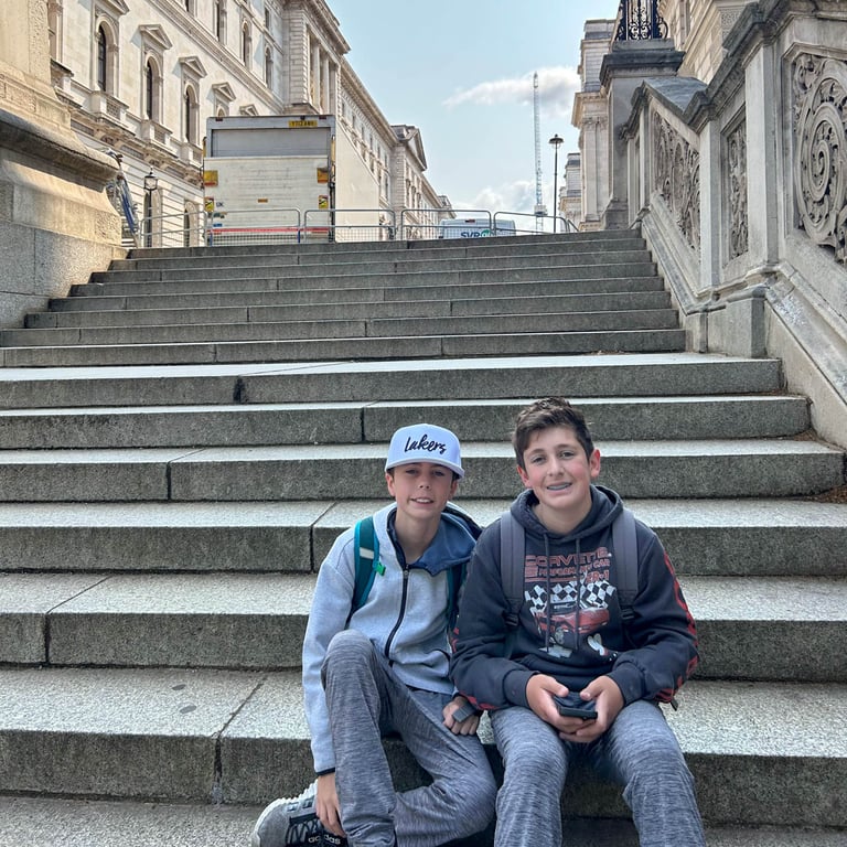 Tyler and Max on steps at Churchill War Rooms