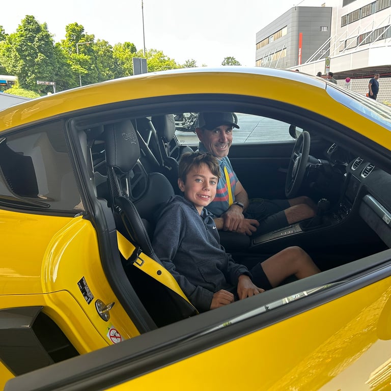 Max and dad in the Porsche