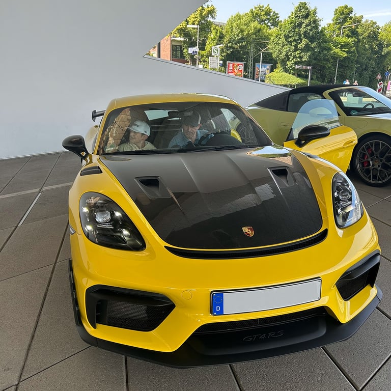 Tyler and dad in the Porsche