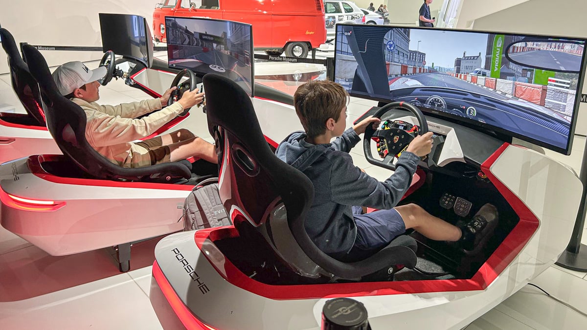 Kids driving the Porsche simulator