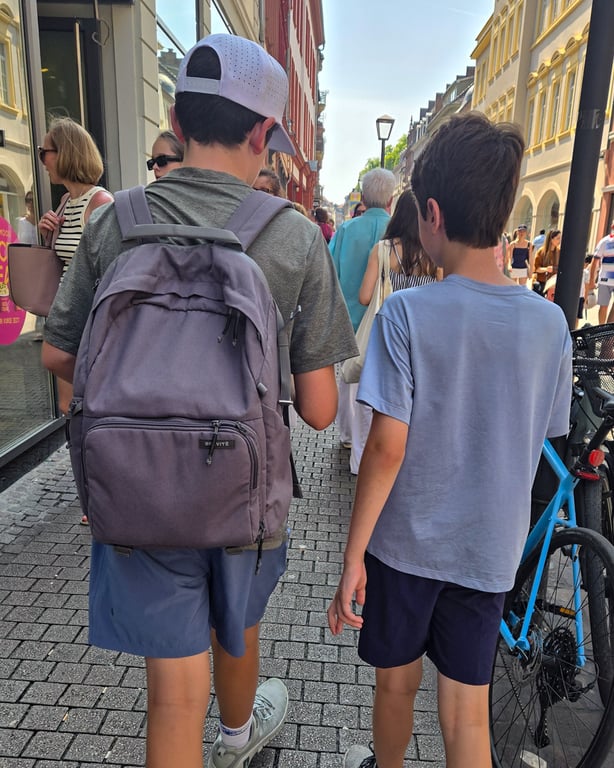 Tyler and Max walking and talking together